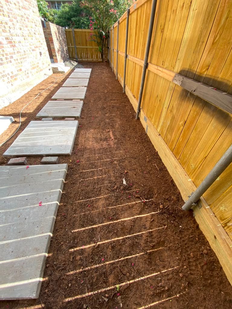 Finished artificial turf installation by Rainlandscaping
